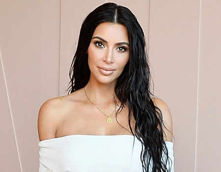Sem querer, Kim Kardashian confirma que terá uma menina 5