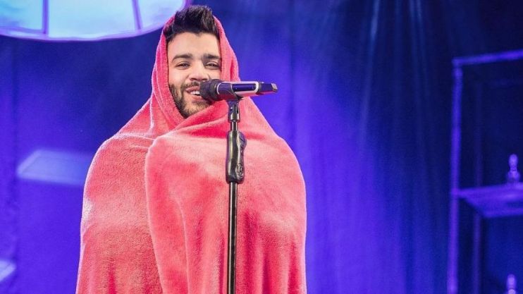 A história por trás da foto de Gusttavo Lima com cobertor durante show 11
